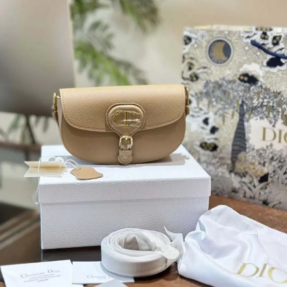 Close-up of silver-tone clasp on Dior Women Dior Bobby East-West Bag Biscuit