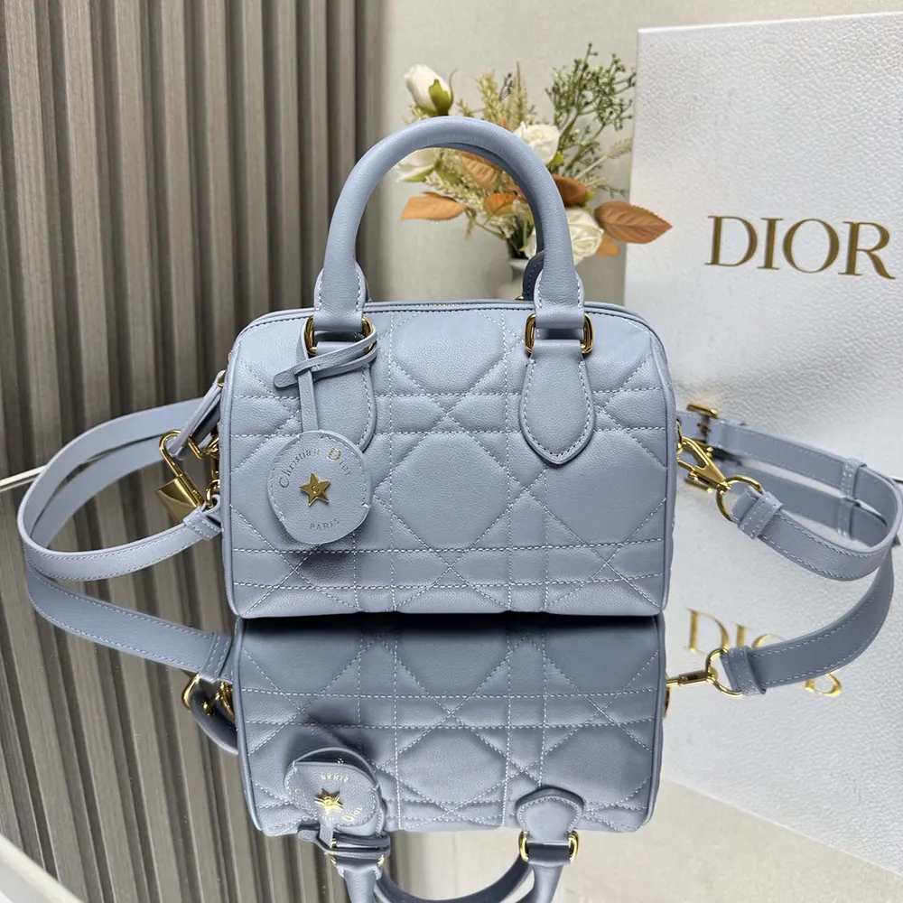 Close-up of macrocannage pattern and silver Dior clasp on Dior Groove 20 Bag