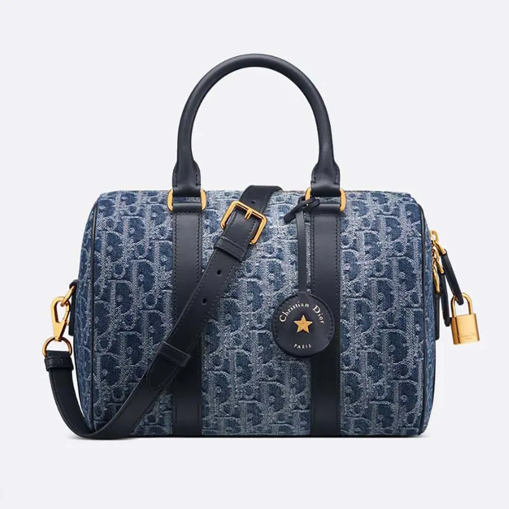 Front view of Dior Women Groove 25 Bag Blue Denim Dior Oblique Jacquard
