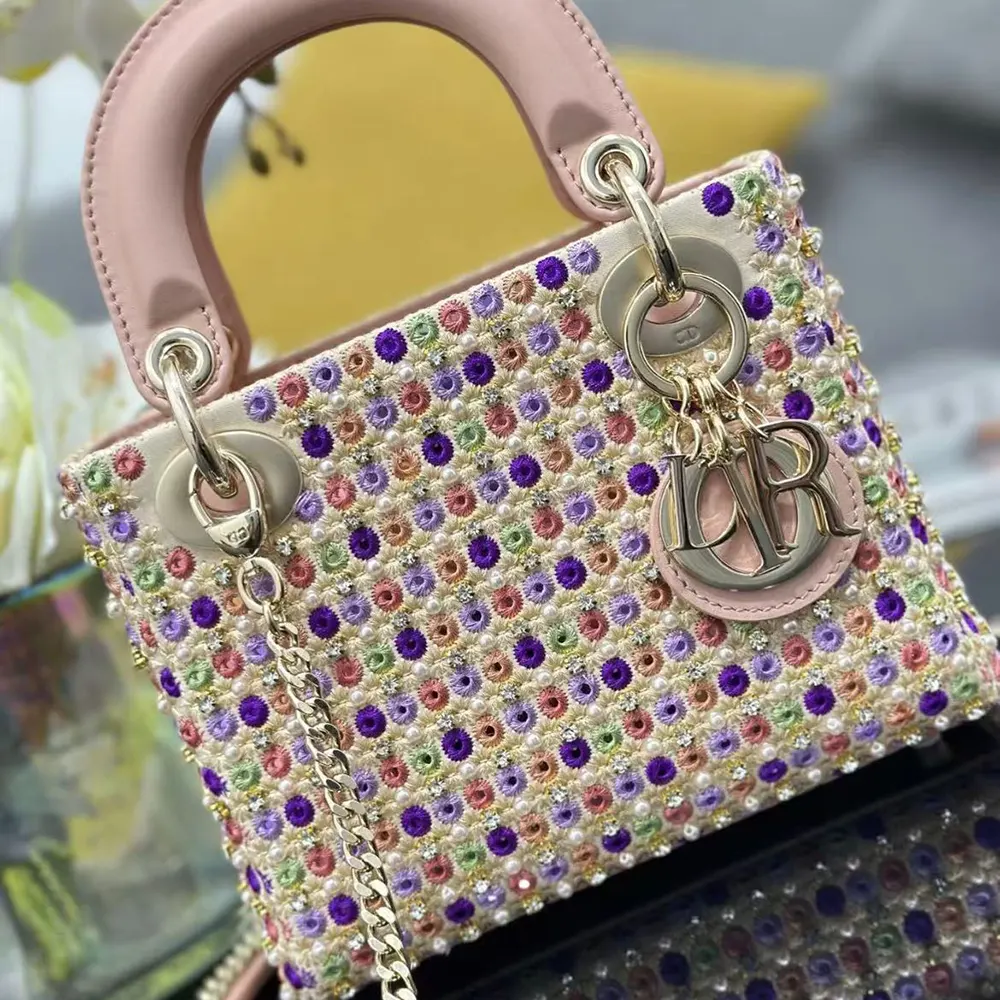 Side angle showing adjustable strap and metallic calfskin texture on Lady Dior Bag