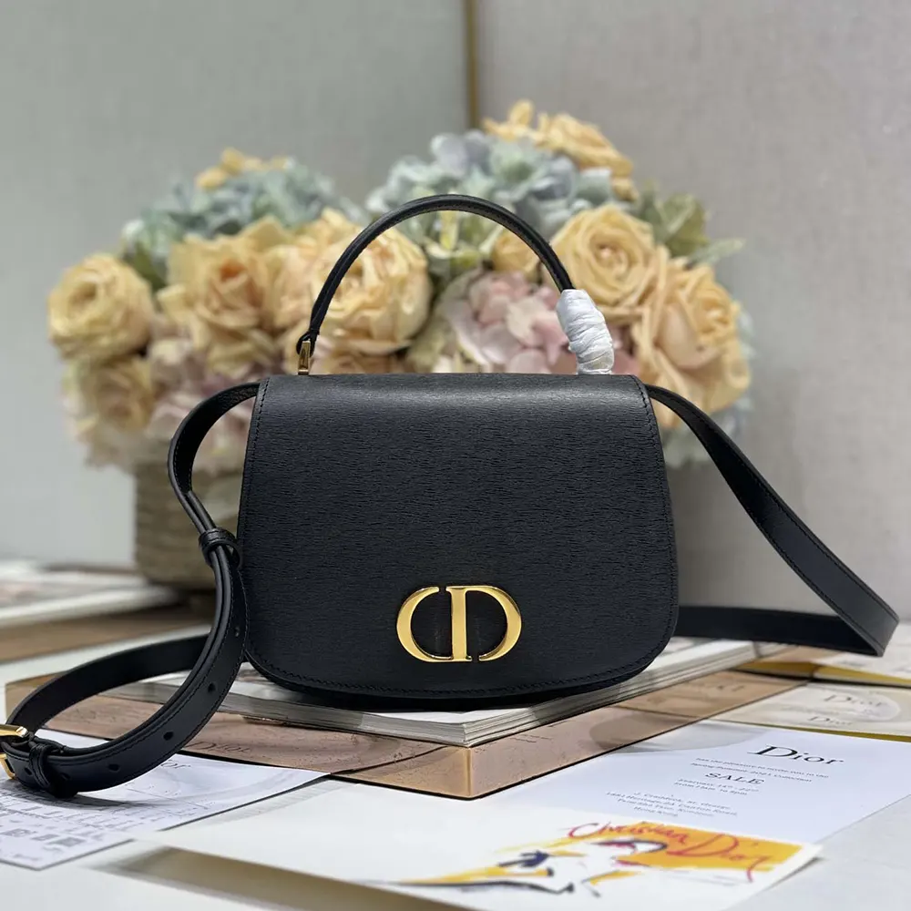 Close-up of silver 'CD' hardware on Dior Women Medium 30 Montaigne Avenue bag