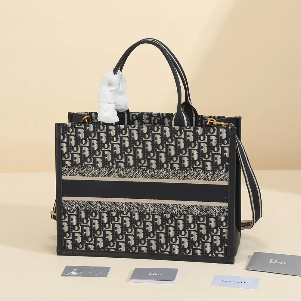 Side angle showing silver hardware on Dior Women Medium Dior Book Tote