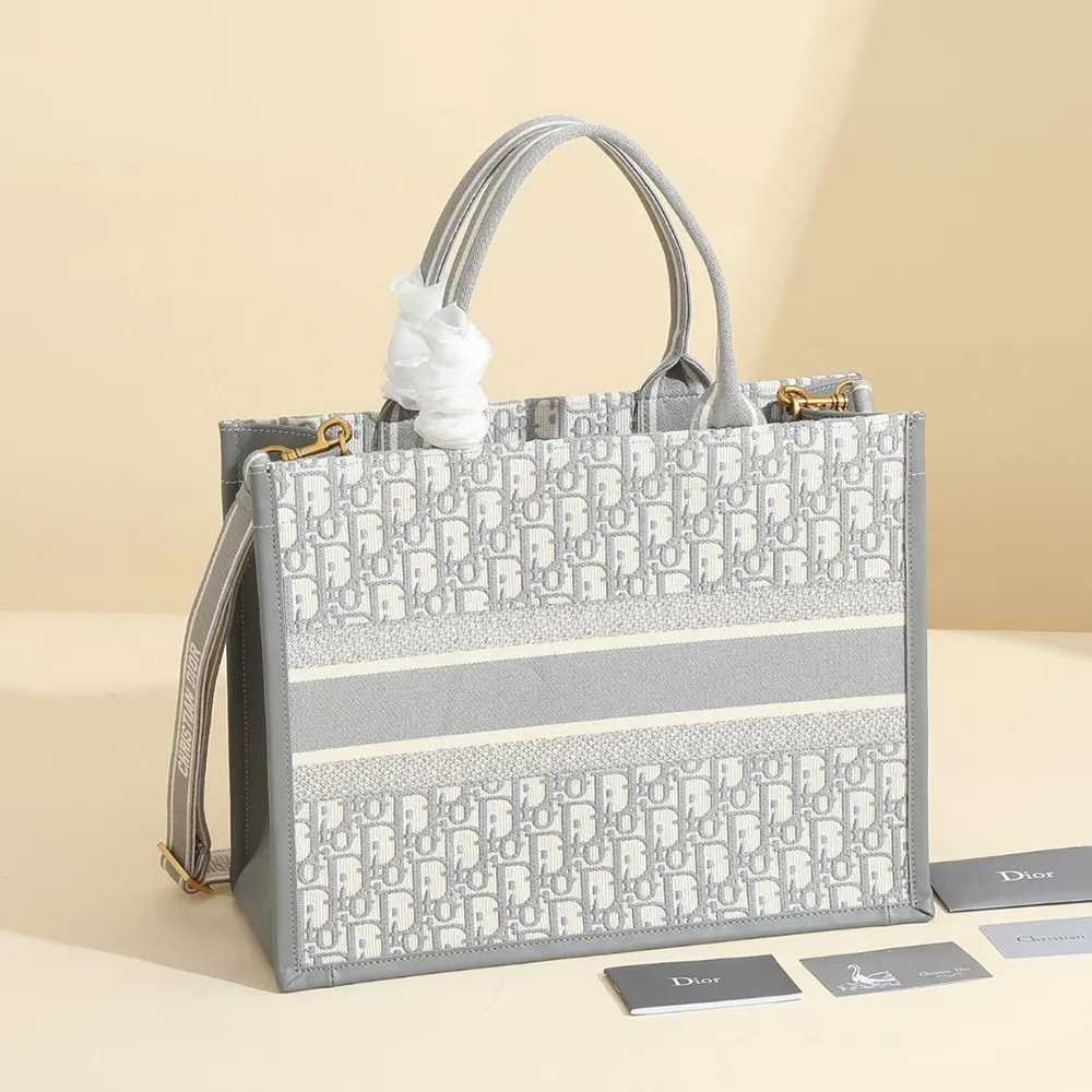 Side angle showing silver hardware on Dior Women Medium Dior Book Tote