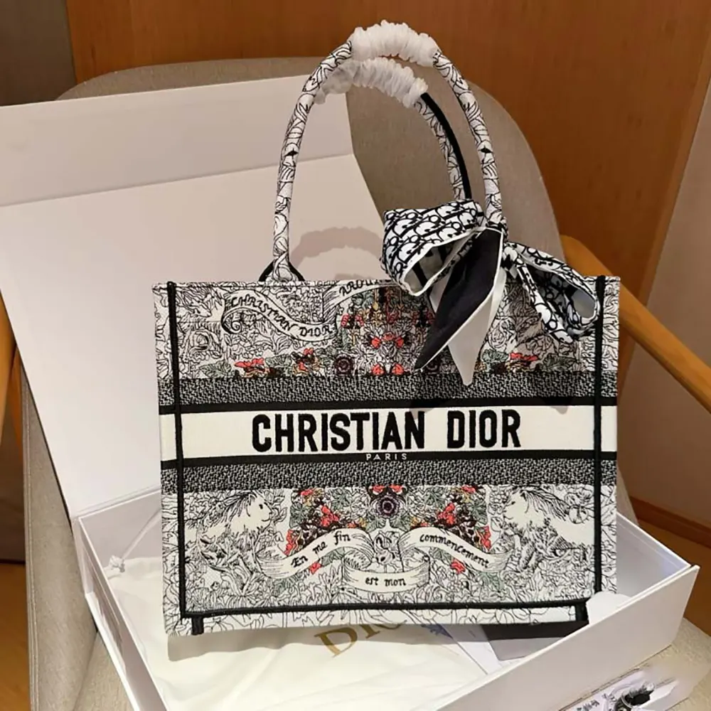Close-up detail of latte embroidery on Dior Women Medium Dior Book Tote