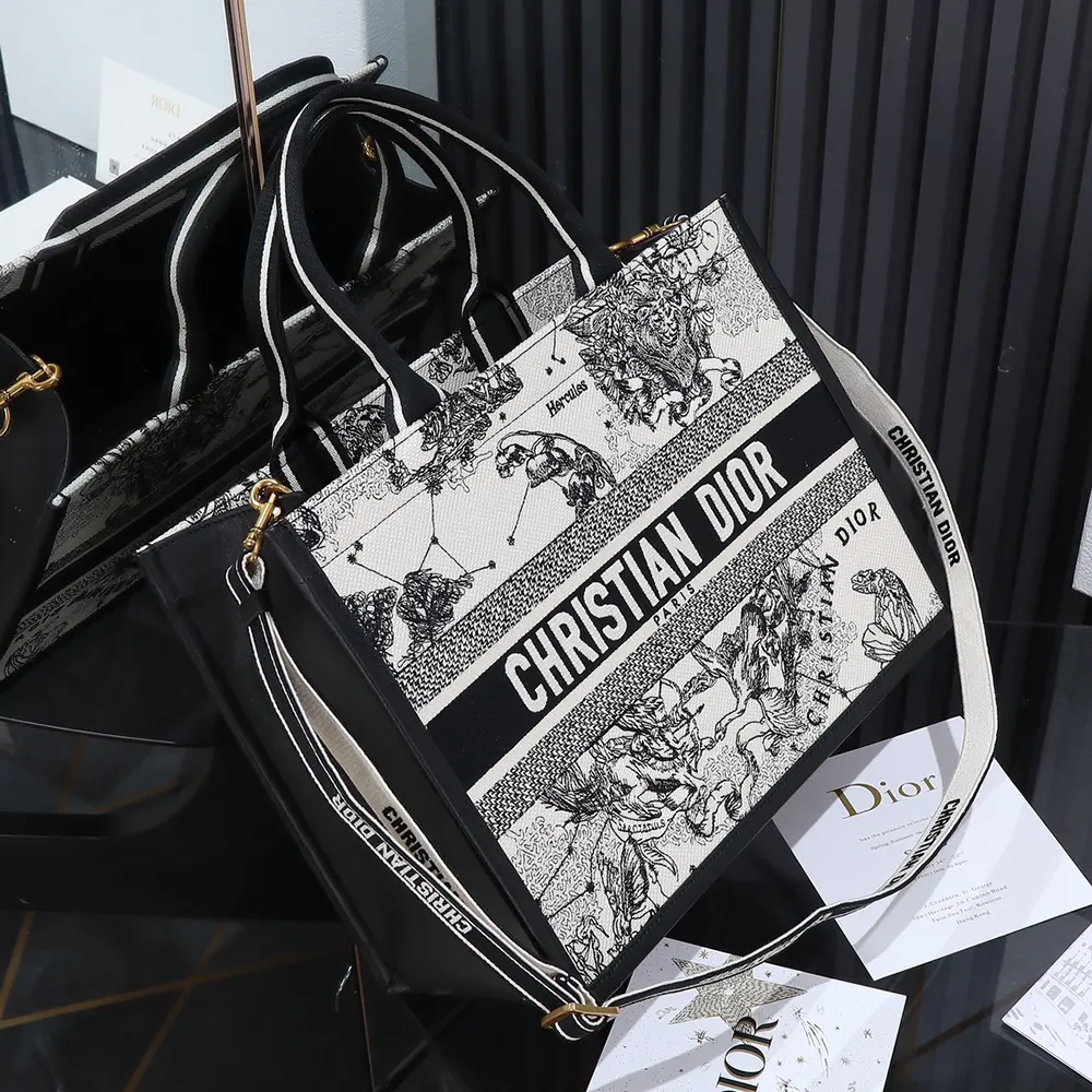 Side angle showing silhouette and zipper closure of Dior Women Medium Dior Book Tote