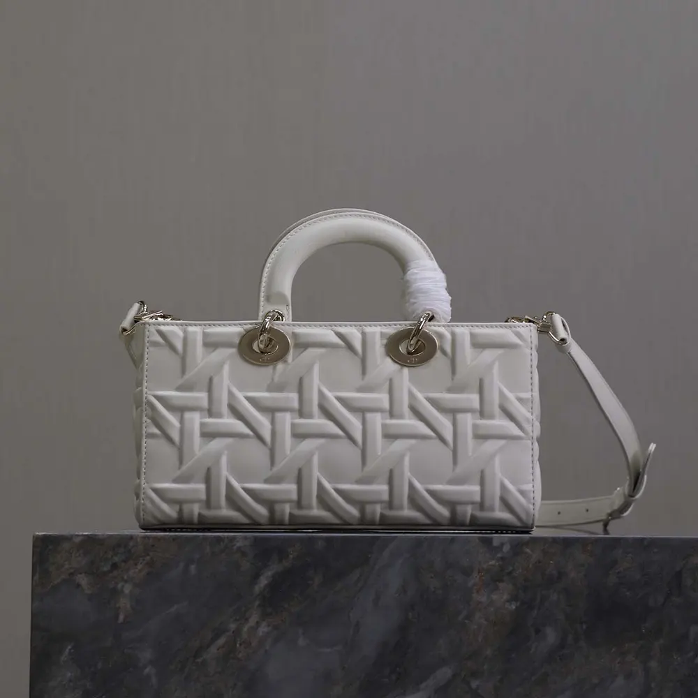 Close-up of latte graphic cannage quilting on Dior Women Medium Lady D-Joy Bag