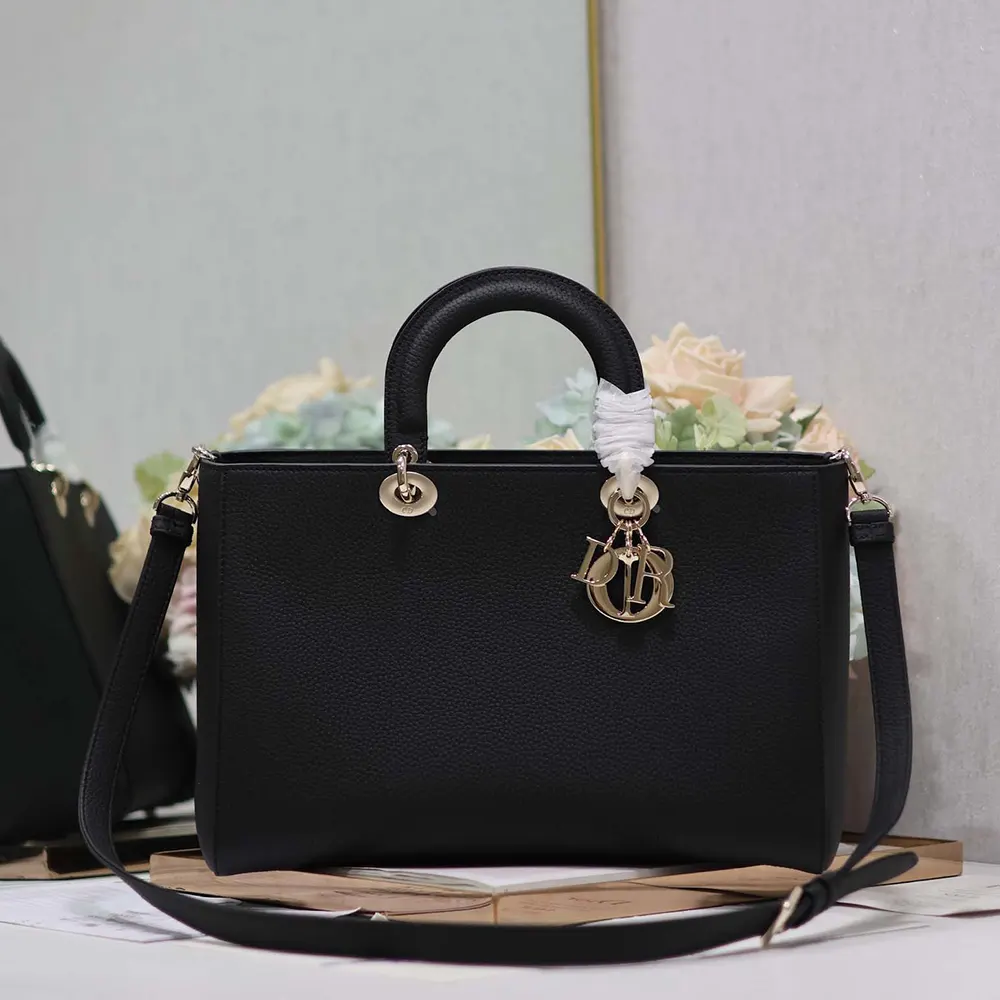 Side angle showing flap closure of Dior Women Large Lady D-Sire My ABCDior Bag