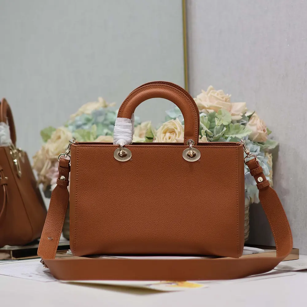 Side profile showing silhouette and shoulder strap of Dior Women Medium Lady D-Sire Bag