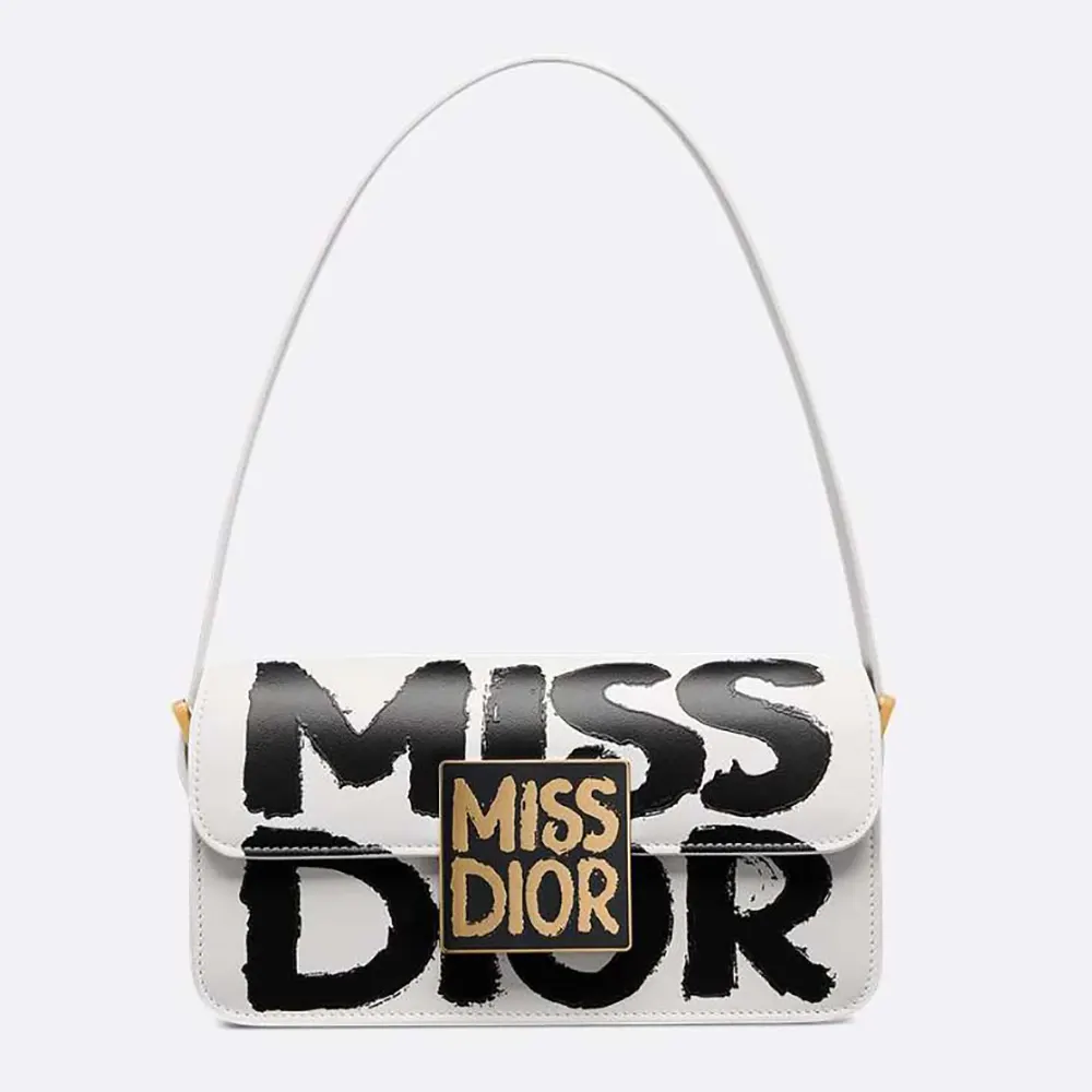 Front view of Dior Women Miss Dior Flap Bag White and Black with graffiti print