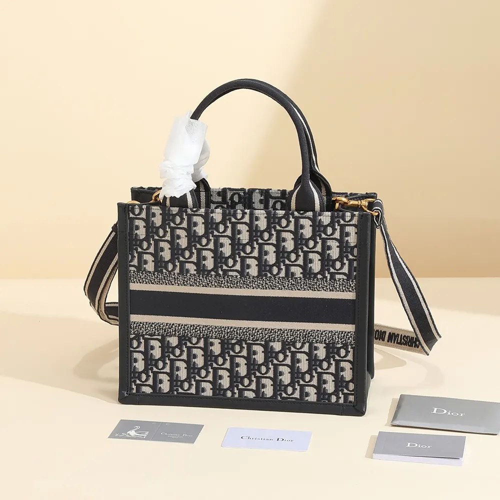 Side angle showing polished hardware on Small Dior Book Tote
