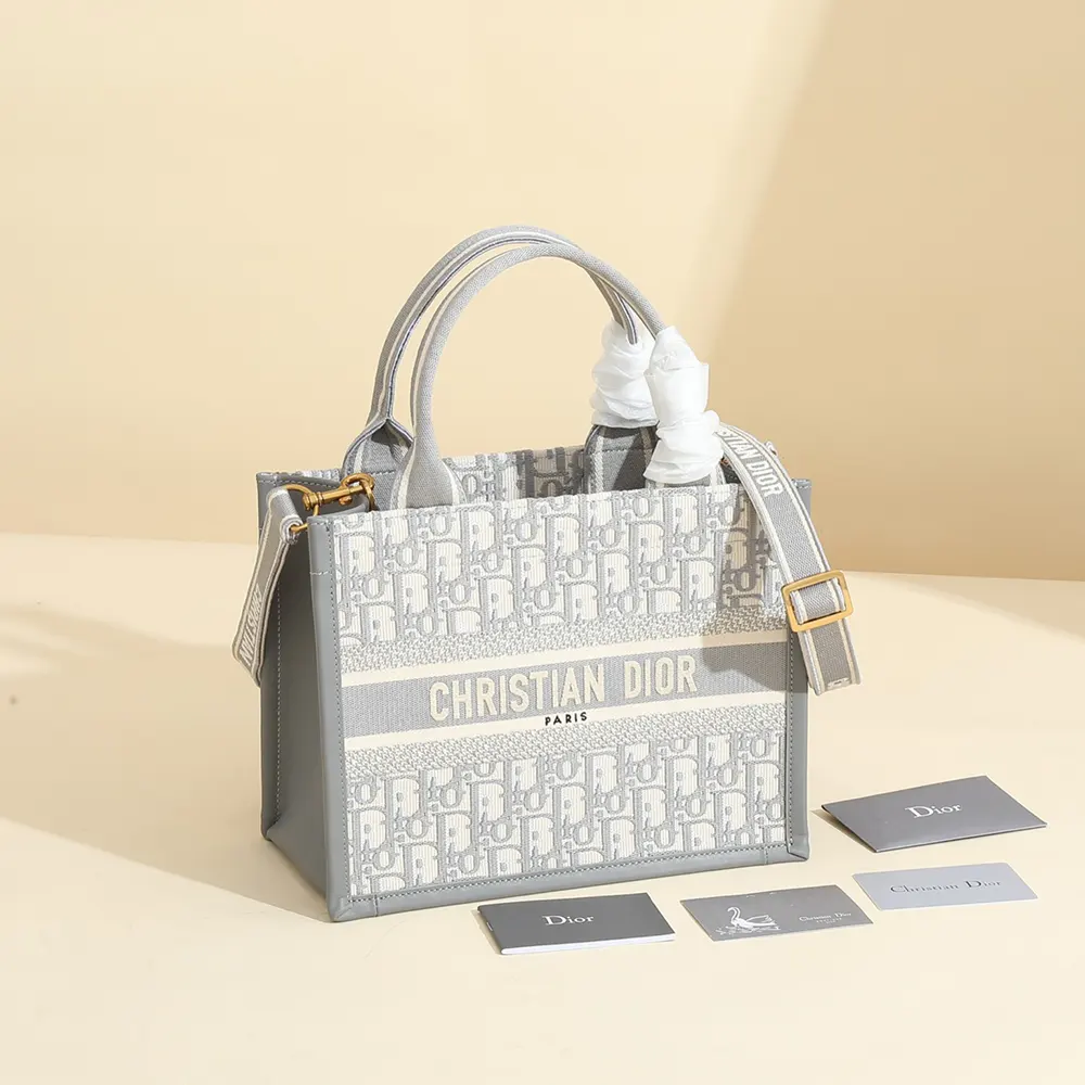 Close-up of gray Dior Oblique embroidery on small Dior Book Tote