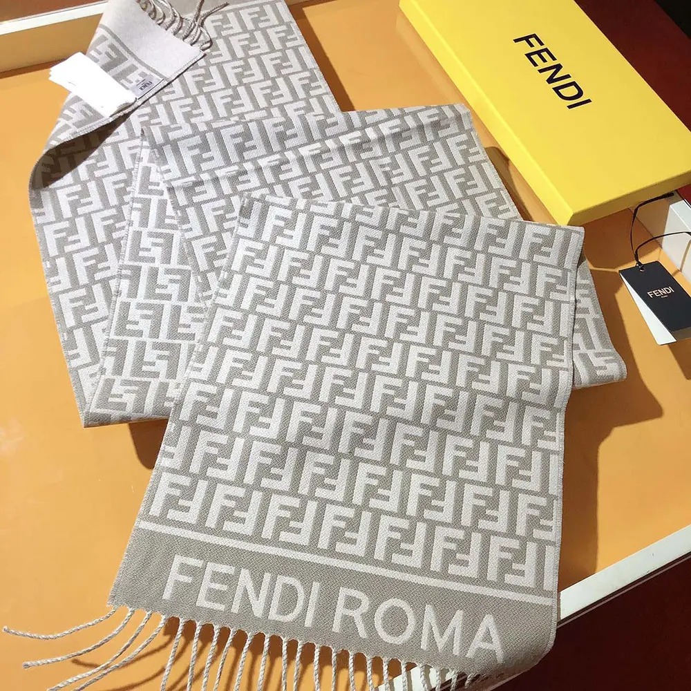 Close-up of embossed FF logo and wool cashmere texture on scarf