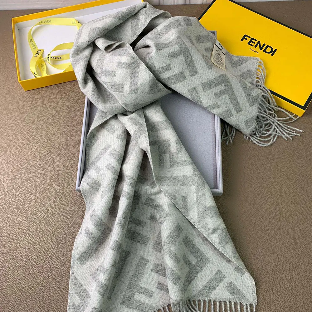 Side angle showing fringe finish on Fendi Unisex FF Scarf Pale Gray