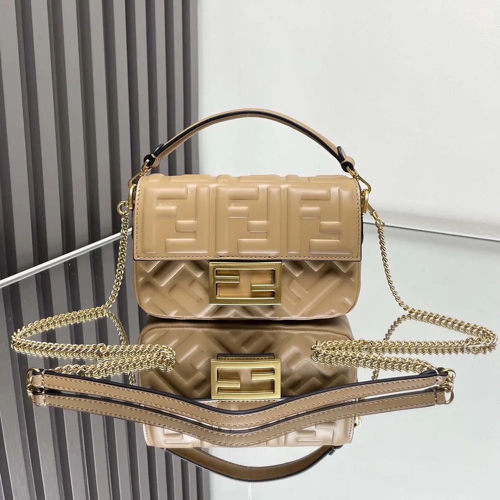 Close-up of FF motif hardware on Fendi Women Baguette Mini Dove Gray Nappa Leather Bag