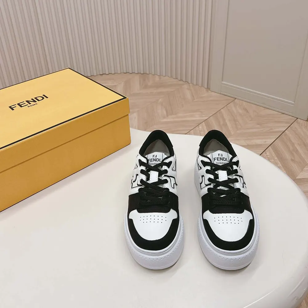 Close-up of black leather and lace details on Fendi Match Low-tops