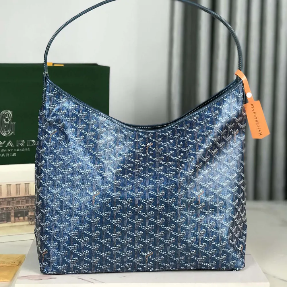 Side view highlighting leather trims on the Goyard Bohème Hobo bag
