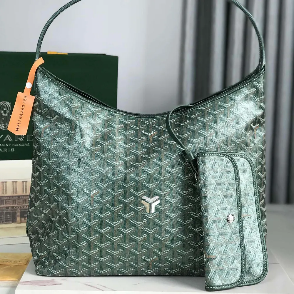 Close-up of gold-tone hardware and leather trim on Goyard Bohème Hobo bag