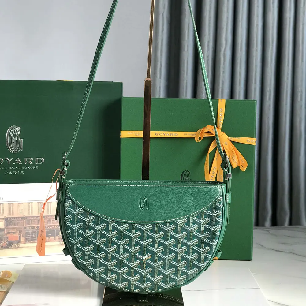Close-up of green Chevron canvas and leather trim on Hirondelle Bag