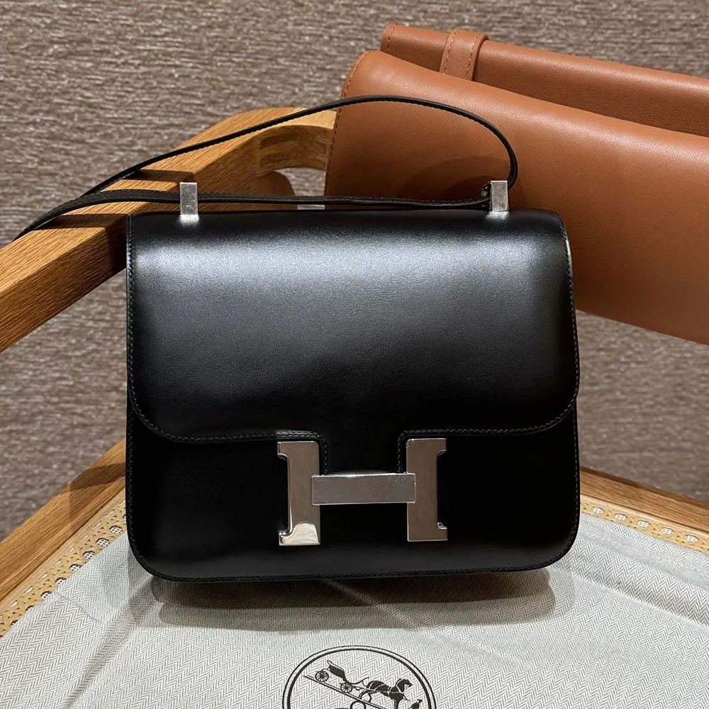 Side angle showing structured silhouette of Hermes Women Constance 24 Bag