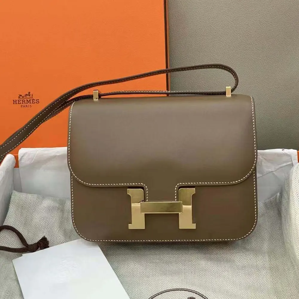Close-up of gold H clasp on Hermes Women Constance 24 Bag