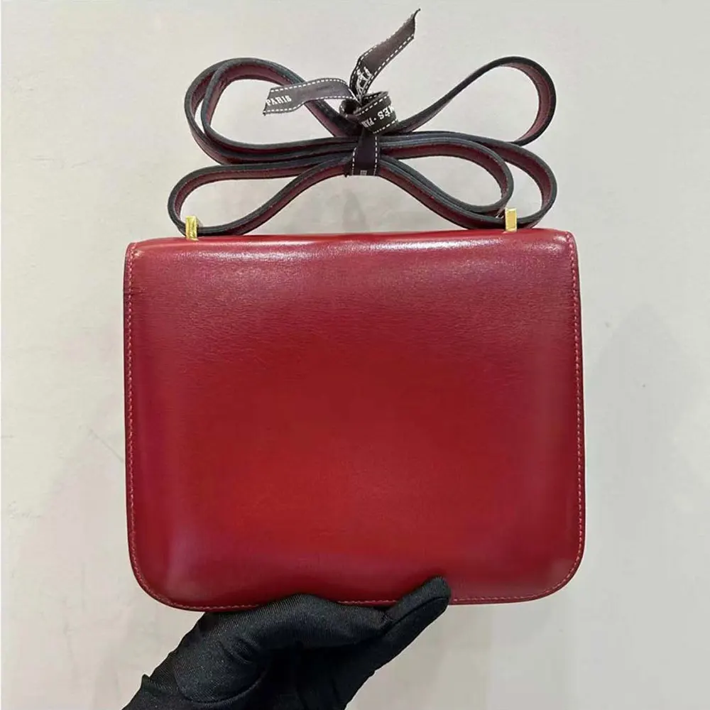 Side angle showing structured silhouette of Hermes Women Constance 24 Bag