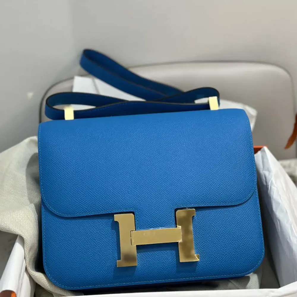 Side angle showing structured silhouette of Hermes Women Constance 24 Bag