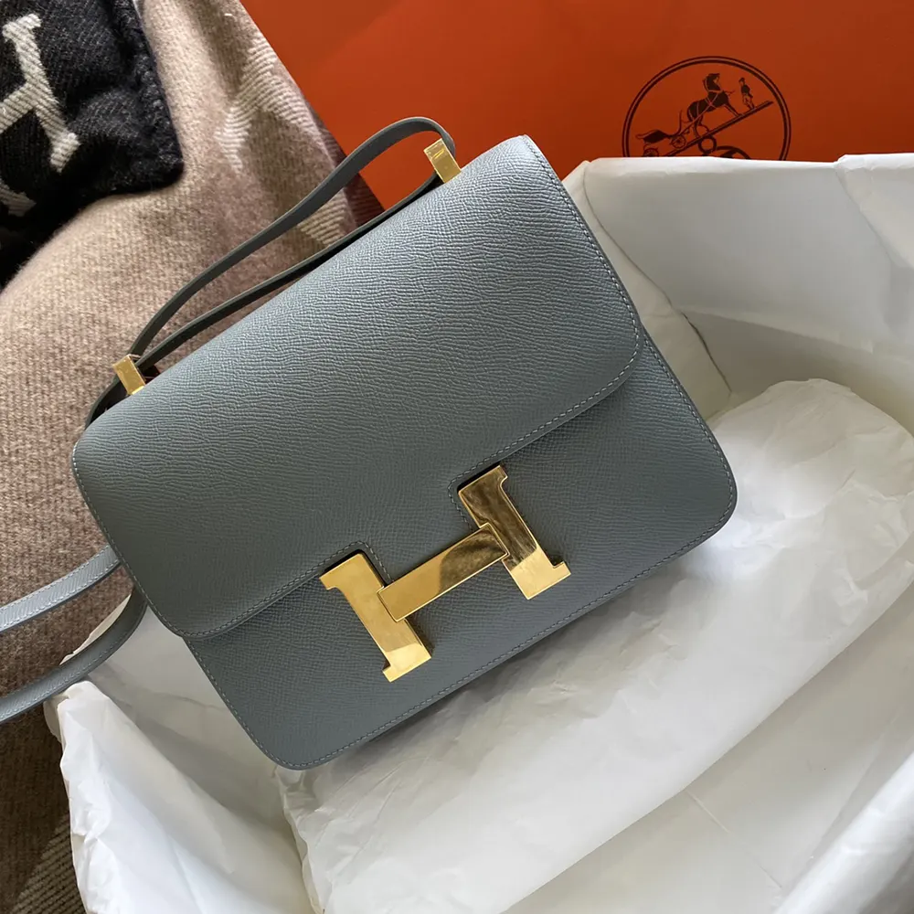 Close-up of gold H clasp on Hermes Women Constance 24 Bag