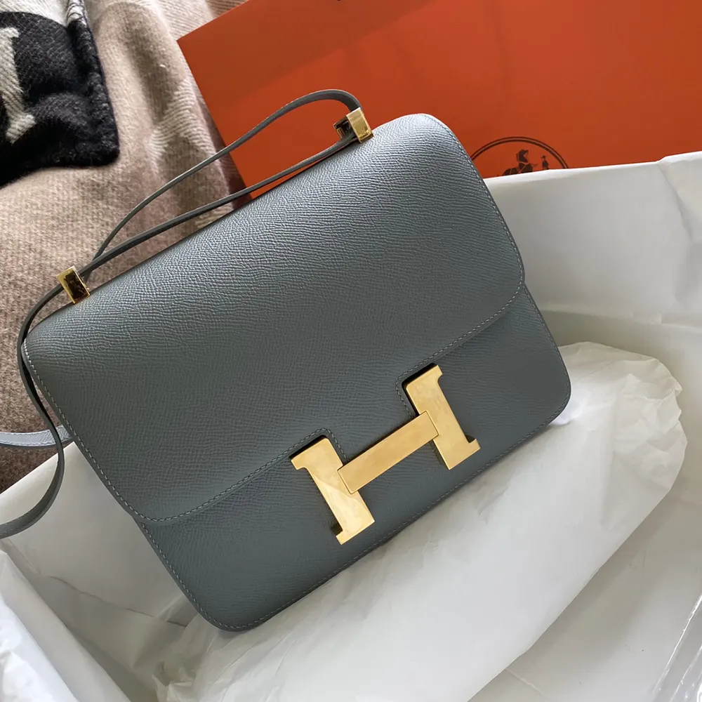 Side angle showing structured silhouette of Hermes Women Constance 24 Bag