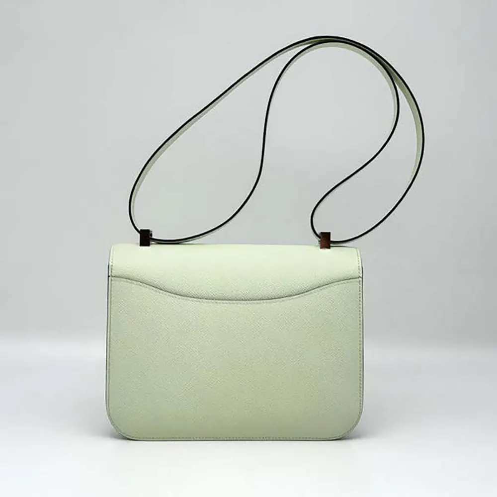 Side angle showing structured silhouette of Hermes Women Constance 24 Bag