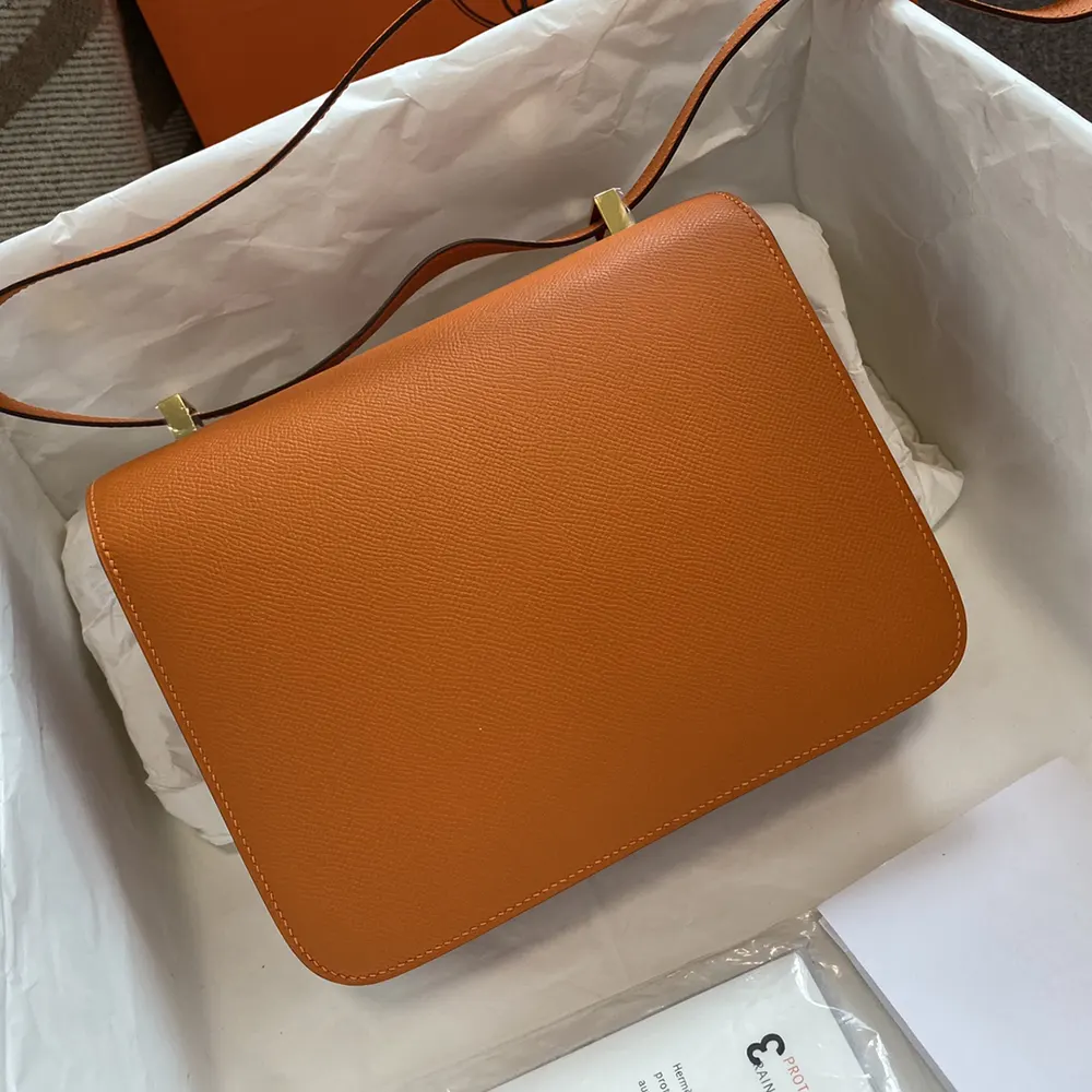 Side angle showing structured silhouette of Hermes Constance 24 Bag