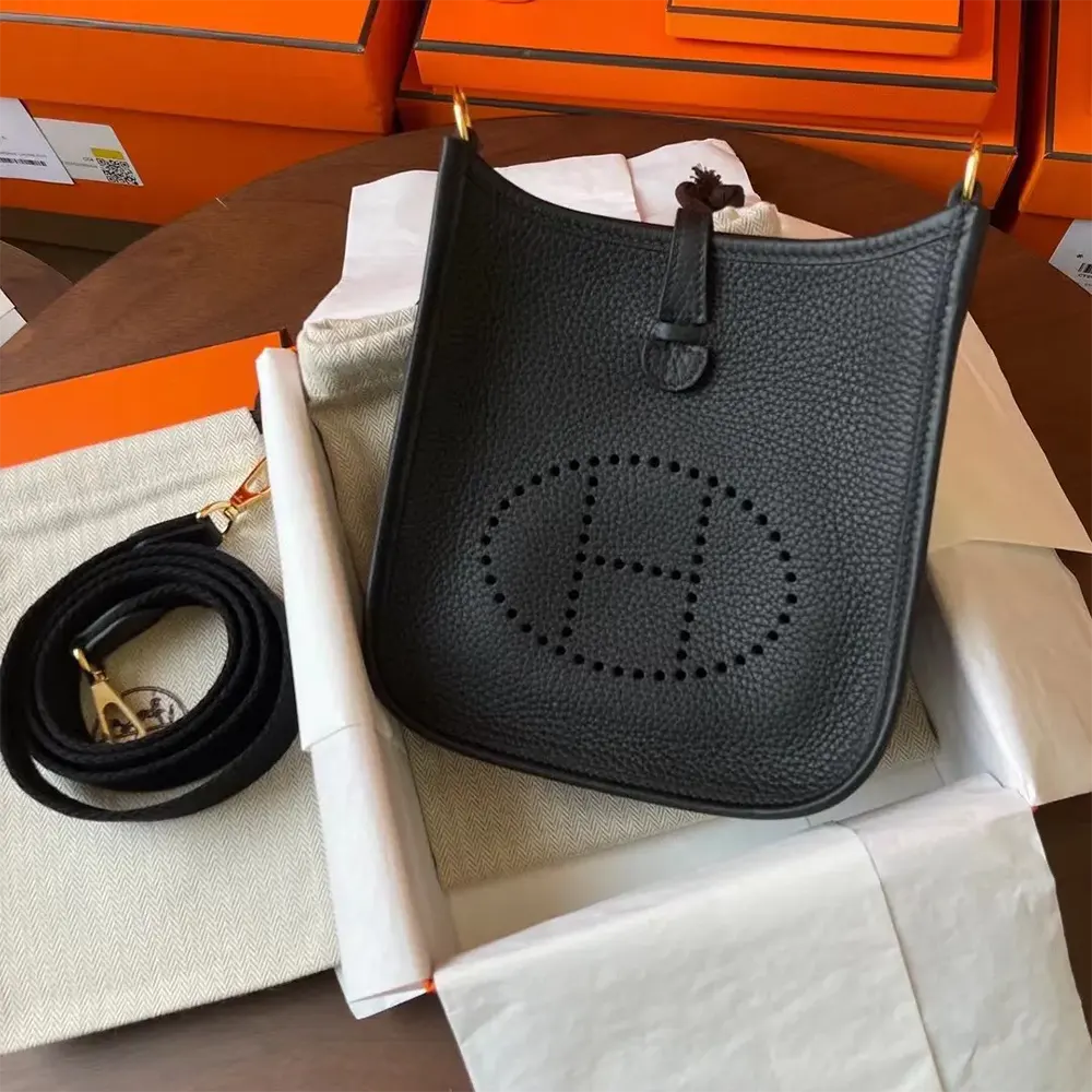 Side angle showing adjustable strap on Hermes Women Evelyne 16 Amazone