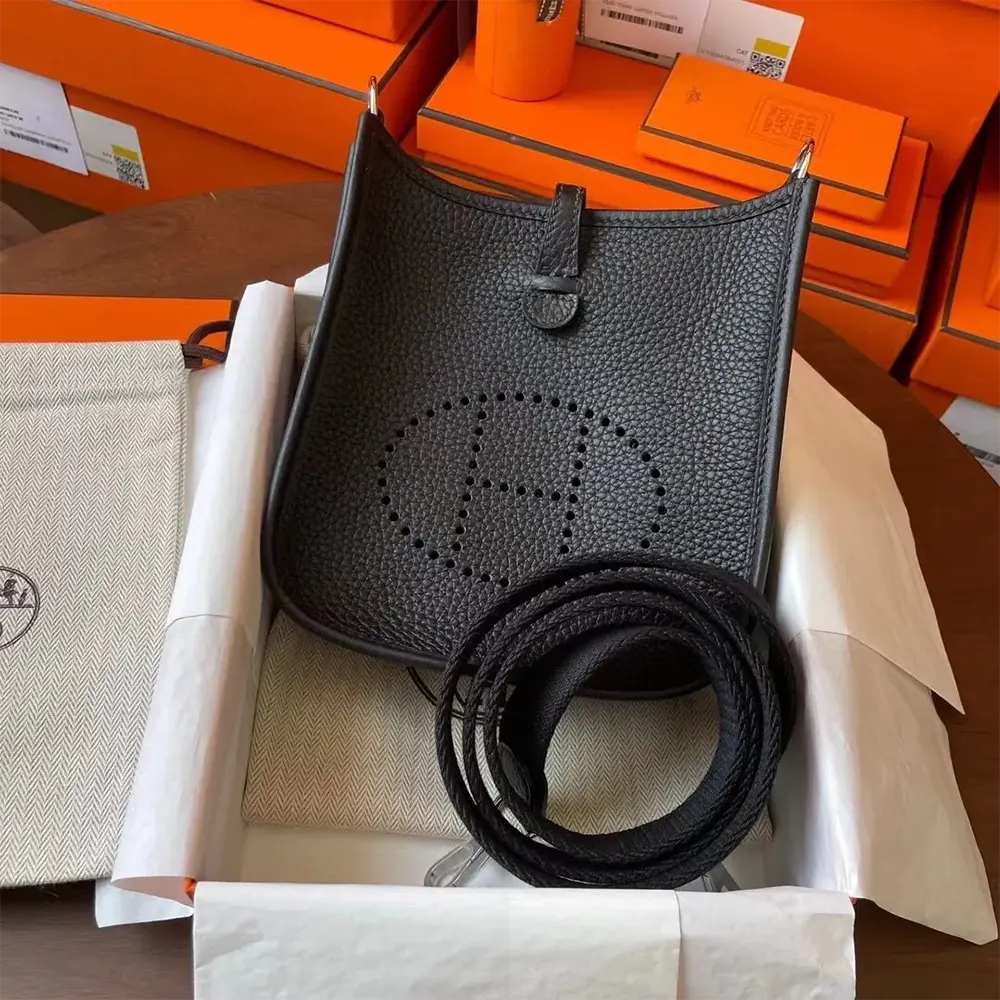 Side angle showing adjustable shoulder strap on Hermes Evelyne 16 Amazone