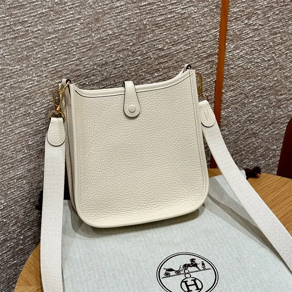 Side angle showing Clemence leather texture of Hermes Evelyne 16 Amazone