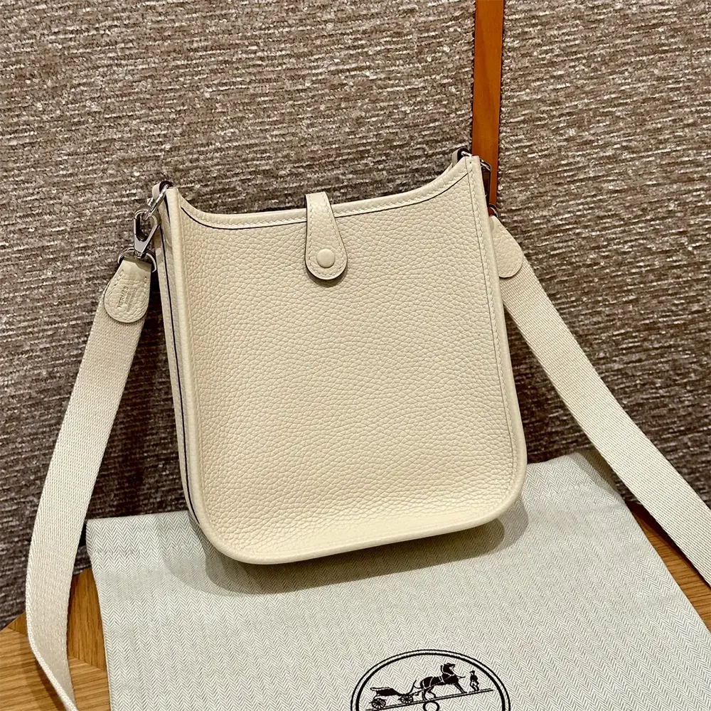 Side angle showing adjustable strap on Hermes Women Evelyne 16 Amazone