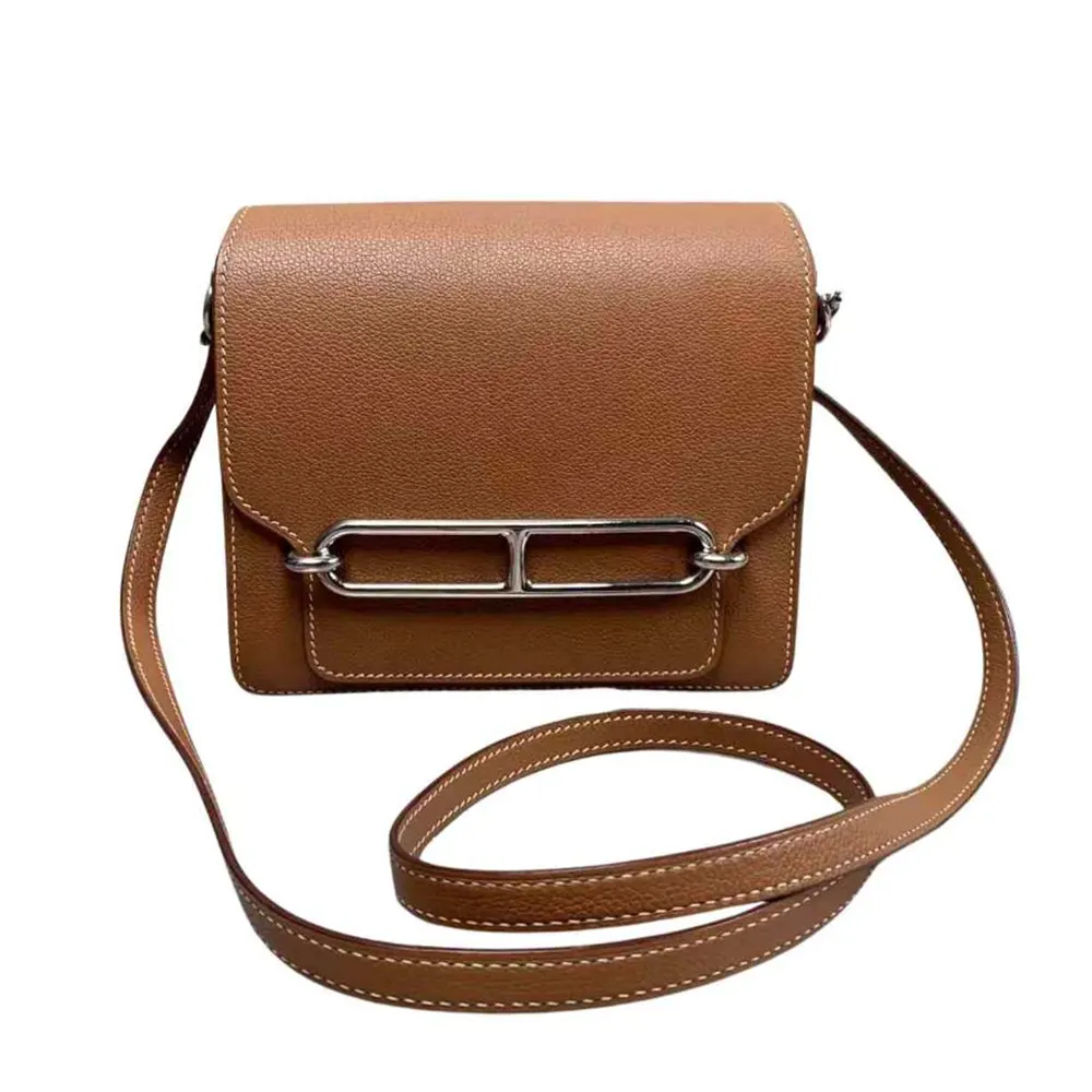 Front view of Hermes Women Roulis Mini Bag in brown Evercolor calfskin