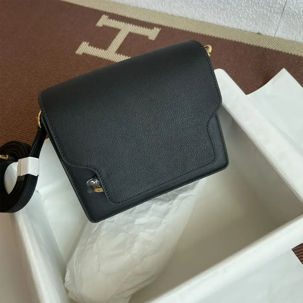 Side angle showing silhouette of Hermes Women Roulis Mini Bag