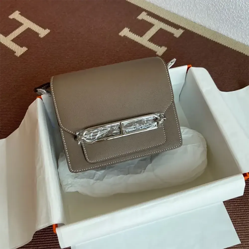 Front view of Hermes Women Roulis Mini Bag in gray calfskin