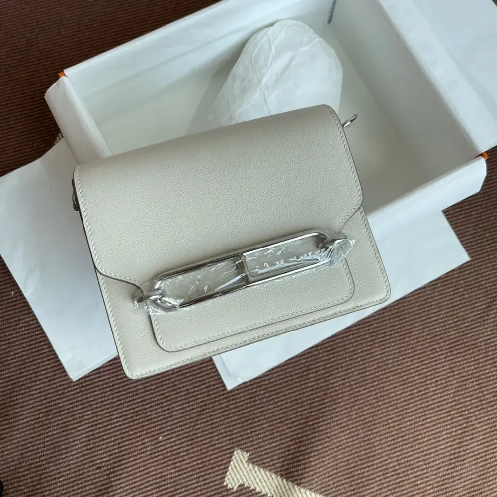 Front view of Hermes Women Roulis Mini Bag in Evercolor Calfskin White Silver