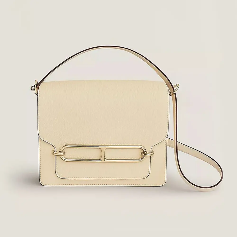 Front angle view of Hermes Women Roulis Mini Bag in white calfskin