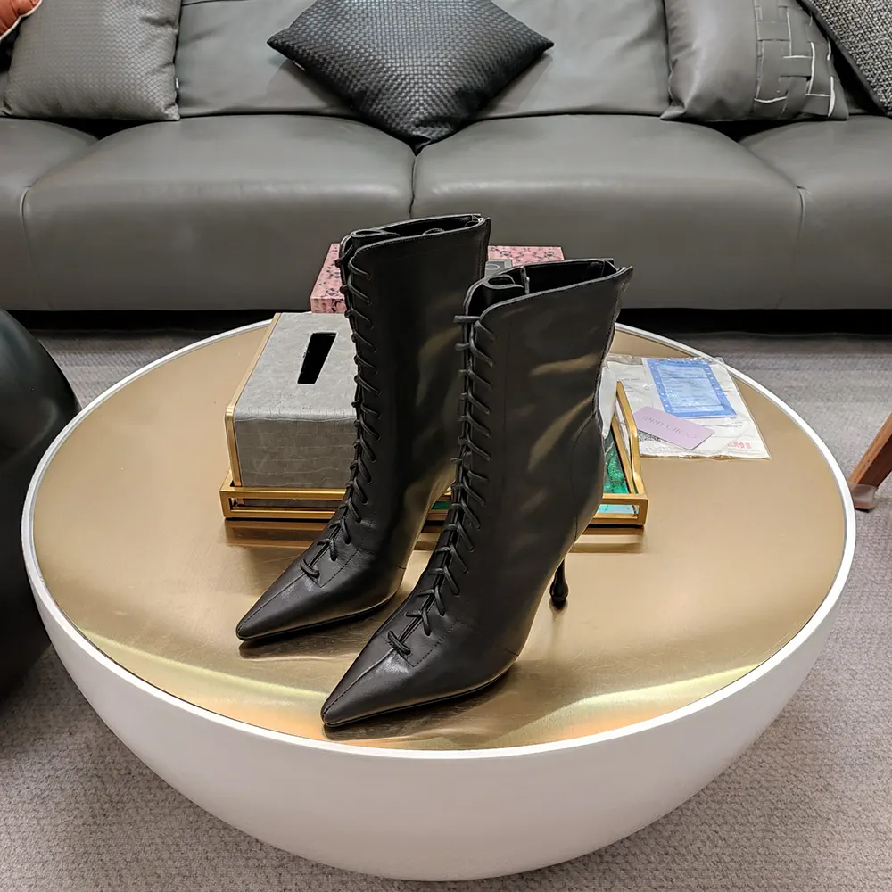 Rear angle showing heel and zipper detail of Jimmy Choo Scarlett Ankle Boot 95