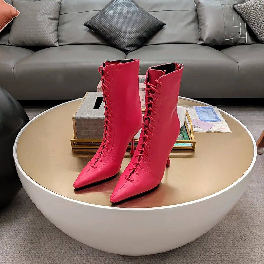 Close-up of gold hardware and zip on Jimmy Choo Scarlett ankle boot
