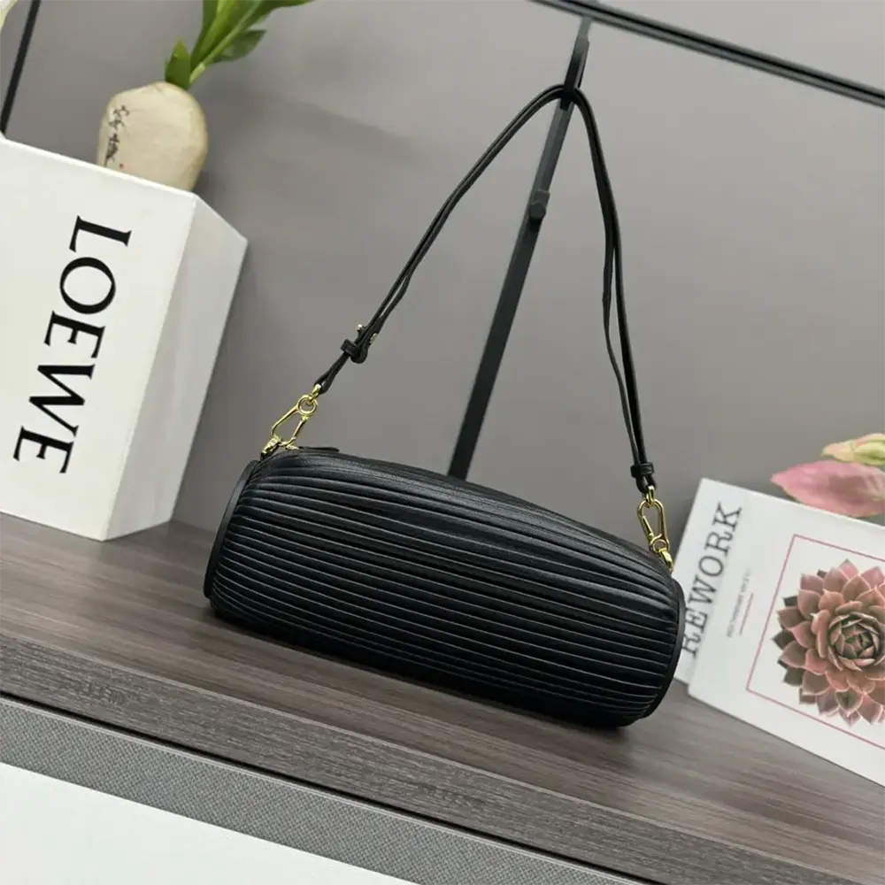 Side angle showing silver hardware on Loewe Unisex Bracelet Pouch