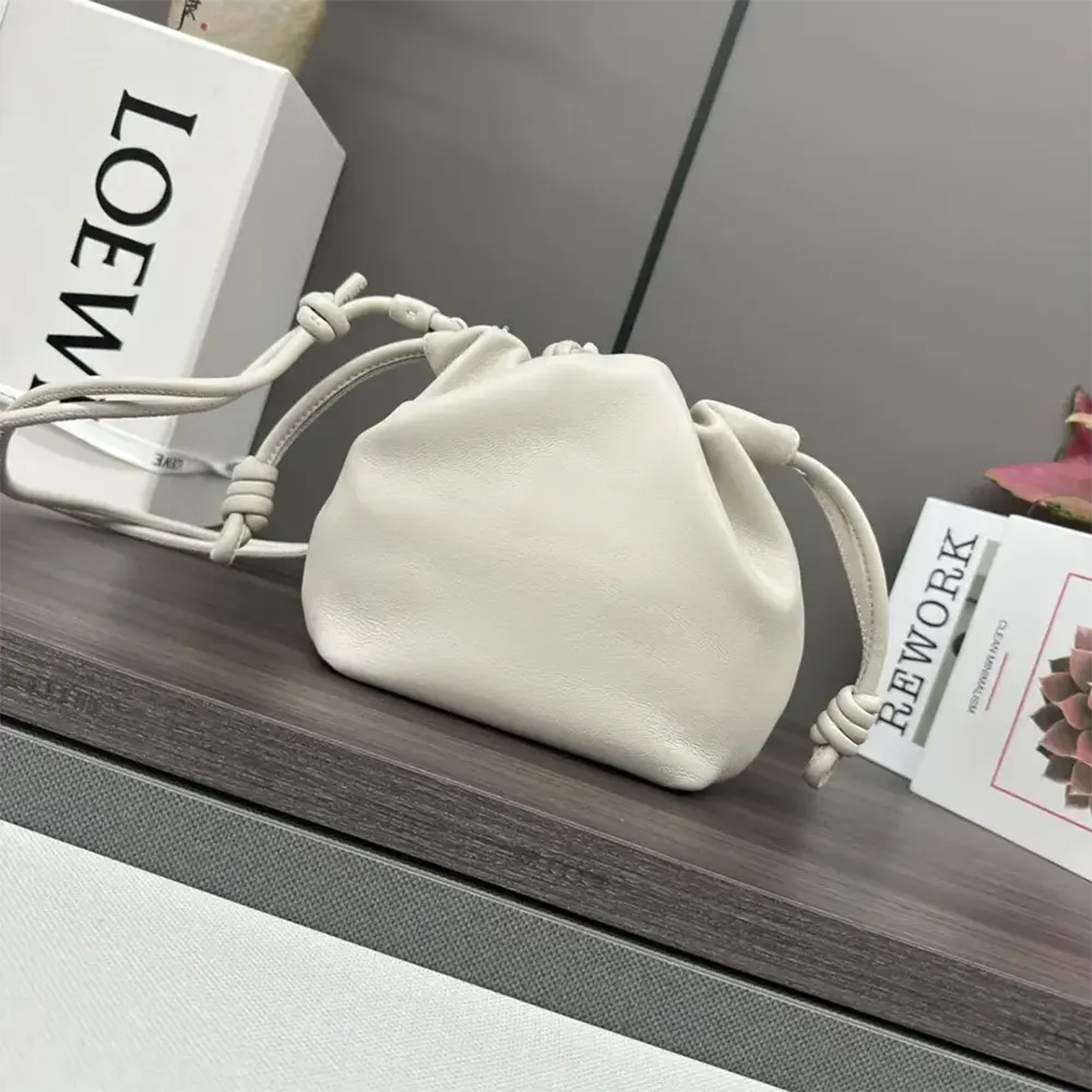 Side angle of compact Loewe Unisex Mini Flamenco Purse Bag with shoulder strap