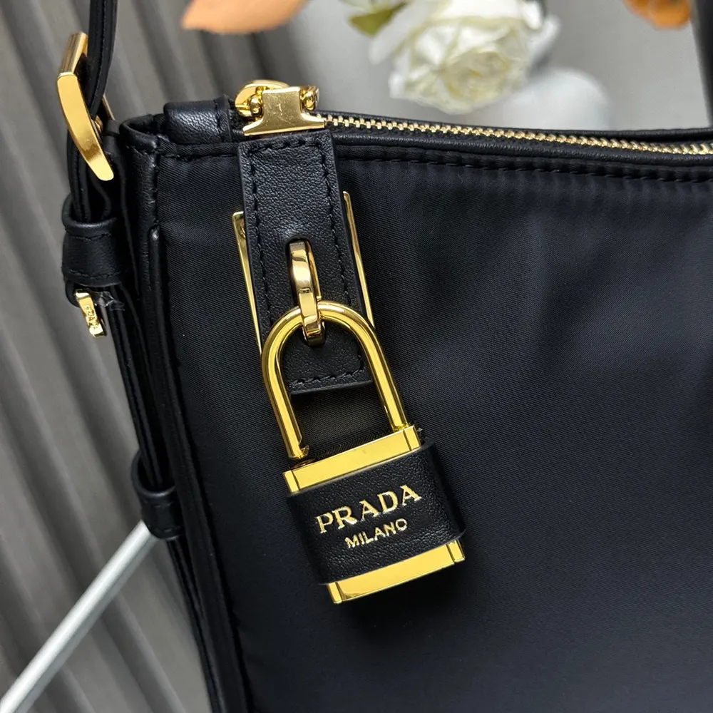 Prada Women Aimée large Re-Nylon and Leather Shoulder Bag with Padlock - image 9