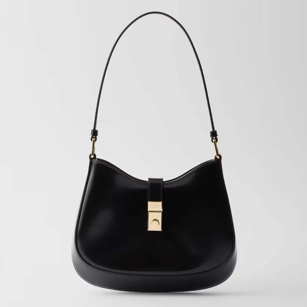 Front angle of Prada Women Cleo Brushed Leather Shoulder Bag with clasp closure