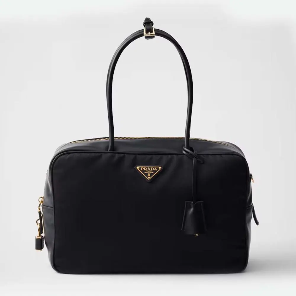 Front view of Prada Women Large Re-Nylon and Leather Top-handle Bag with Padlock