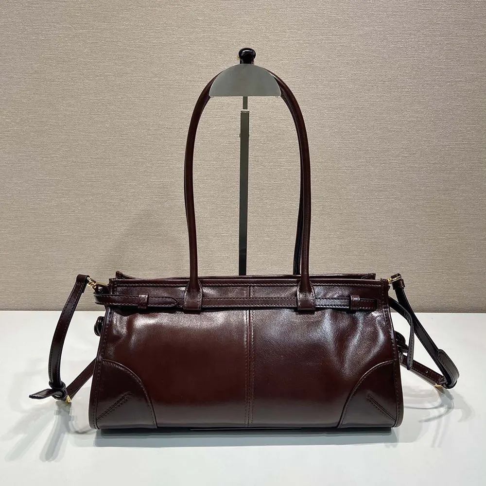 Side profile showing silhouette of Prada Women Medium Leather Handbag