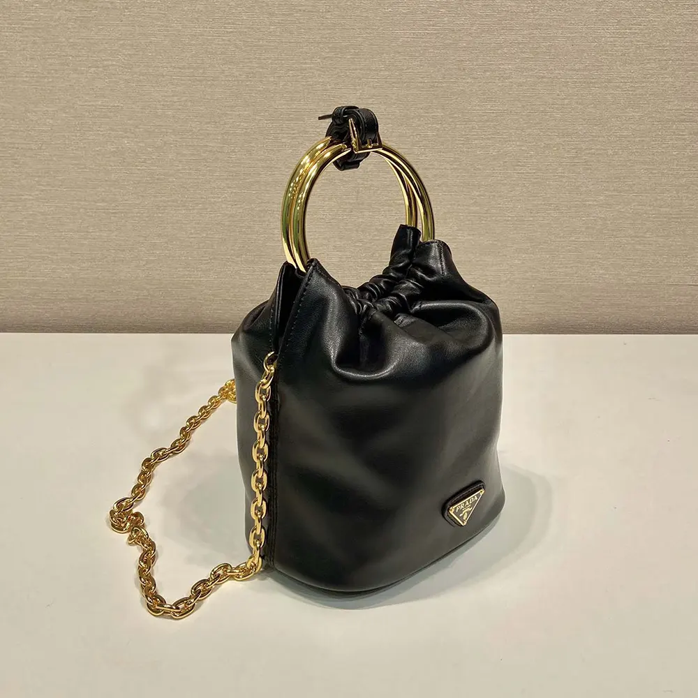 Side profile showing soft nappa leather texture on Prada mini bag