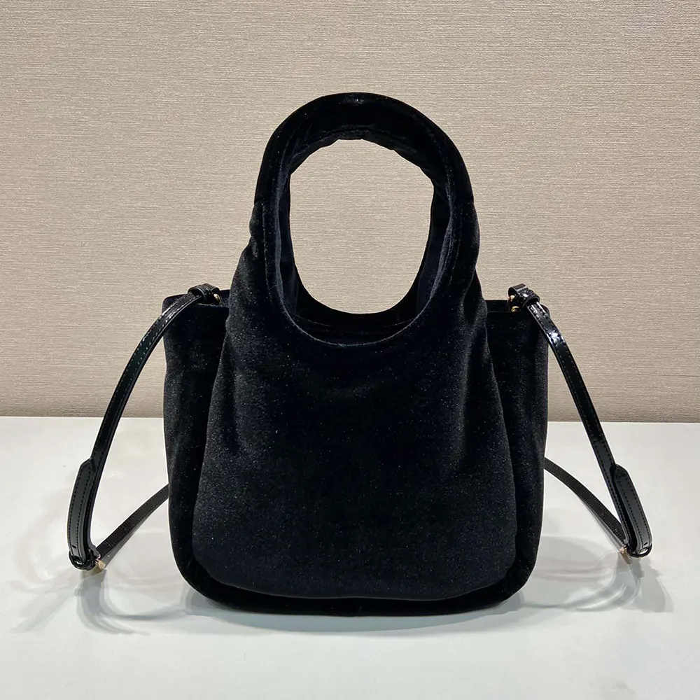 Side angle showcasing padded velvet texture on Prada Women Padded Velvet Mini Handbag