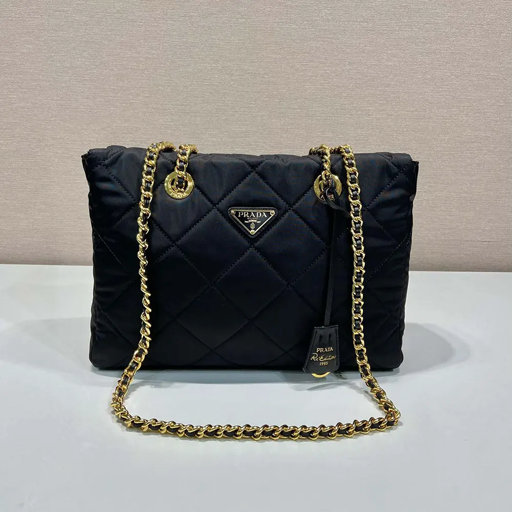 Side angle showing zip closure and nylon texture of Prada Women Prada Re-Edition 1995 tote